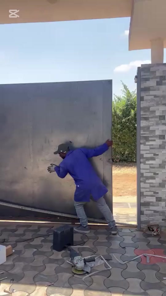 Our installer working on an automatic gate